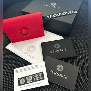 New with all original passports red VERSACE wallet
